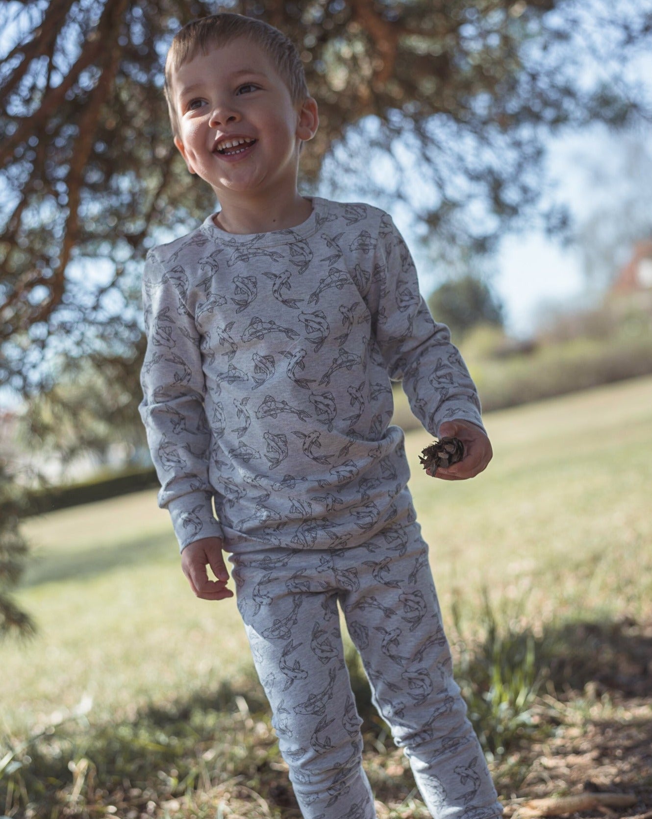 Leggings made from 100% GOTS certified organic cotton covered in our Koi fish allover print. Our leggings are designed with a soft elastic adjustable waist, foldable cuffs at the bottom of the legs.
